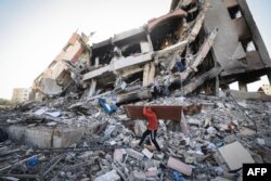 غزہ میں اسرائیل بمباری سے تباہ شدہ عمارت کا ملبہ ، فائل فوٹو