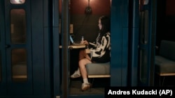 Entrepreneur Becky Litvintchouk works on her computer at a co-working space on Monday, Aug. 12, 2024, in New York. (AP Photo/Andres Kudacki)