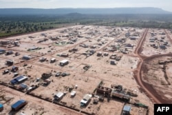 រូបថតកាលពីថ្ងៃទី ៦ ខែកក្កដា ឆ្នាំ២០២៣ បង្ហាញ​ទិដ្ឋភាពនៃ​ភូមិ​រុនតាឯក ក្នុងខេត្តសៀមរាប។ (AFP/AMNESTY INTERNATIONAL)