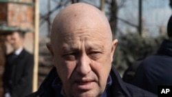 FILE - Yevgeny Prigozhin, the owner of the Wagner Group military company, arrives during a funeral ceremony at the Troyekurovskoye cemetery in Moscow, Russia, on April 8, 2023.