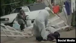 حمله یک روحانی به یک زن که مقامات محلی «اختلاف خانوادگی» نامیدند.