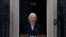 British Prime Minister Liz Truss announces her resignation, outside Number 10 Downing Street, London, Oct. 20, 2022.