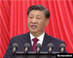 习近平总书记在中共二十大开幕式上作政治报告。