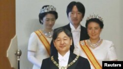 Mfalme mpya Naruhito, na Malkia Masako, Mrithi wa Ufalme Akishino na mkewe malkia Kiko wakihudhuria tafrija ya kutawazwa ufalme katika kasri Tokyo, Japan Mei 1, 2019.