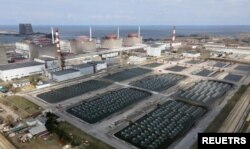 ზაპოროჟიის ატომური ელექტროსადგური კახოვკის წყალსაცავის და მდინარე დნეპრის ფონზე