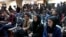 Afghan Journalists attend a press conference of a former president Hamid Karzai in Kabul, Afghanistan, Feb. 13, 2022.