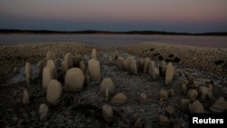 FILE - Guadalperal, also known as the Spanish Stonehenge, is seen due to the receding waters of the Valdecanas reservoir in the outskirts of El Gordo, Spain, August 3, 2022. (REUTERS/Susana Vera/File Photo)