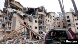 A view shows a residential building destroyed by recent shelling, as Russia's invasion of Ukraine continues, in the city of Irpin in the Kyiv region, March 2, 2022. 