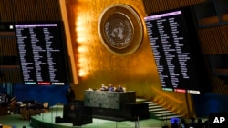 United Nations members vote on a resolution concerning the Ukraine during an emergency meeting of the General Assembly at United Nations headquarters, March 2, 2022. 
