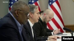 U.S. promises aid and return of diplomats to Kyiv