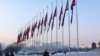 National flags are seen half-staffed on the occasion of the 11th anniversary of the death of Chairman Kim Jong Il in Pyongyang, North Korea, on Dec. 17, 2022. 