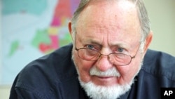 FILE - In this June 28, 2019, photo, US Rep. Don Young answers a reporter's question in Anchorage, Alaska.