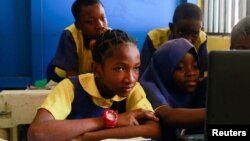 Faridat Bakare, 12, a student enrolled in a special STEM program for children from poor families at the Knosk Secondary School in Kuje, Abuja, Nigeria February 18, 2022. (REUTERS/Afolabi Sotunde)