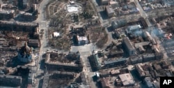 Uharibifu uliofanywa na mashambulizi ya Russia mjini Mariupol nchini Ukraine kama yalivyopigwa picha kutoka angani na kamera za Satellite. (Satellite image ©2022 Maxar Technologies via AP).