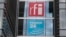 FILE - The headquarters of French national audiovisual media company group France Medias Monde (FMM), display signage for Radio France Internationale (RFI) and France 24, in Issy-les-Moulineaux, near Paris, April 9, 2019. Burkina Faso has suspended broadcasts by RFI.