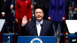 South Korean President Yoon Suk Yeol takes an oath during his inauguration in front of the National Assembly in Seoul, South Korea.