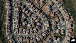 FILE — An aerial view of a housing development in Tucson, Arizona.