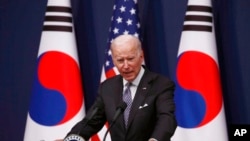 US President Joe Biden attends a joint press conference with South Korean President Yoon Suk Yeol at the presidential office in Seoul, May 21, 2022.
