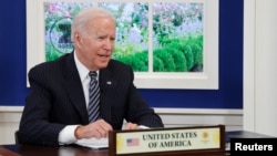 រូបឯកសារ៖ ប្រធានាធិបតី​សហរដ្ឋ​អាមេរិក លោក Joe Biden ចូលរួម​ក្នុង​កិច្ចប្រជុំ​ពិសេស​កំពូល​អាស៊ាន​នៅ​សេតវិមាន ក្នុង​រដ្ឋធានី​វ៉ាស៊ីនតោន ថ្ងៃទី ២៦ ខែតុលា ឆ្នាំ២០២១។