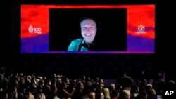 Tesla CEO Elon Musk talks during a virtual meeting at the B20 Summit ahead of the G20 leaders summit in Nusa Dua, Bali, Indonesia, Nov. 14, 2022. 