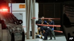 Israeli police examine the scene of a shooting attack near the Shuafat refugee camp in Jerusalem, Oct. 8, 2022. 