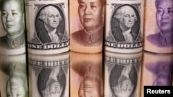 美元与人民币钞票图示