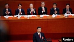 ប្រធានាធិបតី​ចិន​លោក Xi Jinping ចូលរួម​ក្នុង​ពិធី​បើក​សមាជ​ជាតិ​លើក​ទី ២០ នៃ​បក្ស​កុម្មុយនីស្ត​ចិន​នៅ​ក្នុង​សាល Great Hall of the People នៅ​ទីក្រុង​ប៉េកាំង កាលពី​ថ្ងៃទី១៦ ខែតុលា ឆ្នាំ២០២២។