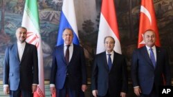 Dîmeneke arşîvê ji hevdîtina wezîrên derve yên Sûrîyê, Tirkîyê, Îran û Rûsyayê.