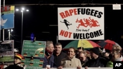 PEGIDA activists rally against the German government's refugee and migrant policies, in Leipzig, eastern Germany, Jan. 11, 2016.