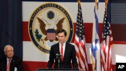 White House senior adviser Jared Kushner, right, speaks as U.S. Ambassador to Israel David Friedman listens during the opening ceremony of the new US embassy in in Jerusalem, May 14, 2018. 
