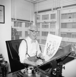 Cartoonist Rube Goldberg, 81, is shown in his New York City apartment, April 24, 1964 after he completed his last cartoon.