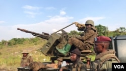 Jeshi la Jamhuri ya Kidemokrasia ya Congo, FARDC, likielekea katika mji wa Sakae kupambana na waasi wa M23. 09.02.2023. Picha na VOA