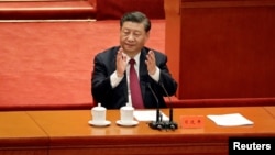 中国国家主席参加在北京中国人民大会堂举行的北京冬奥会冬残奥会总结表彰大会。(2022年4月8日)