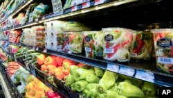 Vegetais à venda num supermercado em Nova Iorque (Foto de Arquivo)