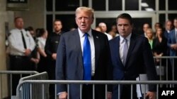 Rais wa zamani na mgombea urais wa Chama cha Republikan Donald Trump akizungumza na waandishi wa habari baada ya kukutwa na hatia katika kesi ya uhalifu katika Mahakama ya Manhattan, New York City, on Mei 30, 2024.