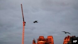 Notre Dame cathedral is pictured when the sun rises, in Paris, France, Jan. 4, 2020.