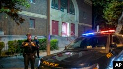 Police guard Temple Beth-El synagogue in Jersey City, New Jersey, on Nov. 3, 2022. The FBI said it received information about a "broad" threat to synagogues in the eastern state of the U.S. The warning prompted some municipalities to send extra police to guard houses of worship.
