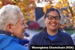 Ohio's state senator Tina Maharath (right), the first Asian-American woman elected to the Ohio Senate, talked to her constituent ahead of the November 2022 midterm election.