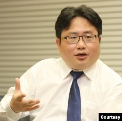 位于台北的日本产经新闻社支局长矢板明夫(Yaita Akio)