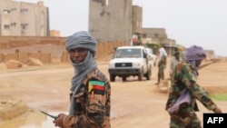 ARCHIVES - Des combattants du Mouvement national de libération de l'Azawad (MNLA) à Kidal le 28 août 2022.