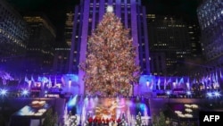 The Christmas Tree in Rockefeller Plaza is seen during the Lighting ceremony in New York City on November 30, 2022. (Photo by KENA BETANCUR / AFP)