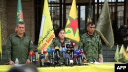 نەورۆز ئەحمەد، ئەندامێکی فەرماندەیەتی هێزەکانی سوریای دیموکرات (وێنەی ئەرشیف)