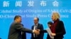 FILE: Marion Koopmans, (R) and Peter Ben Embarek, (C), of the World Health Organization team say farewell to their Chinese counterpart Liang Wannian, (L), after a WHO-China Joint Study Press Conference at the end of the WHO mission in Wuhan, China, Feb 9,