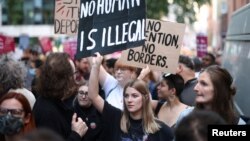 اعتراض به اخراج مهاجران به رواندا