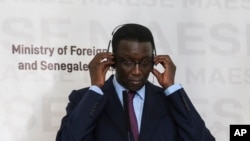 FILE - Senegal's then-Foreign Minister Amadou Ba attends a press conference at the Presidential Palace, in Dakar, Senegal, Feb. 16, 2020.