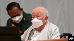 Khieu Samphan, the former head of state for the Khmer Rouge, sits in a courtroom during a hearing at the U.N.-backed war crimes tribunal in Phnom Penh, Cambodia, Thursday, September 22, 2022. (Nhet Sok Heng/Extraordinary Chambers in the Courts of Cambodia via AP)