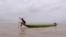 A boy rides a boat across the Tonle Sap lake, in Kampong Loung of Pursat province, Cambodia, on May 04, 2022. (Khan Sokummono/VOA Khmer)
