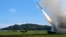In this photo released by China's Xinhua News Agency, a projectile is launched from an unspecified location in China during long-range live-fire drills by the army of the Eastern Theater Command of the Chinese People's Liberation Army, Thursday, Aug. 4, 2022.
