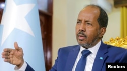 FILE - Somalia's President Hassan Sheikh Mohamud speaks during a Reuters interview inside his office at the presidential palace in Mogadishu, Somalia, May 28, 2022. 