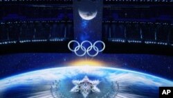 Dancers perform during the opening ceremony of the 2022 Winter Olympics, Friday, Feb. 4, 2022, in Beijing. (AP Photo/Jeff Roberson)